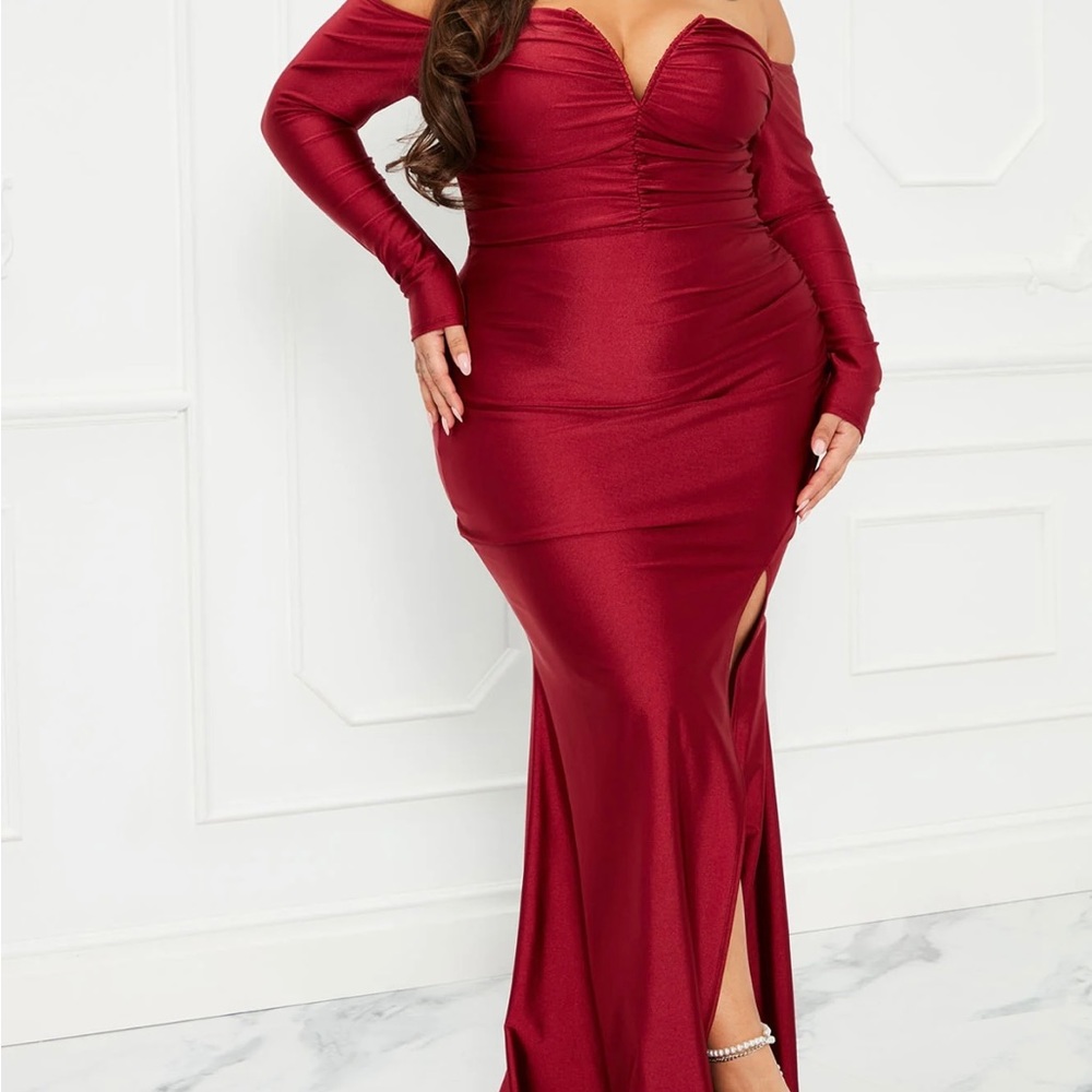 This is a wine colored formal dress from Fashion Nova, size 3x, worn once.